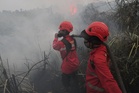 Muslims gather for rain prayers in Indonesia's wildfire-hit South Sumatra