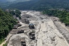Nepal: At least 12 Britons missing after devastating flash floods tear through village
