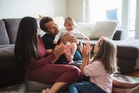 Parental leave system ‘treats fathers like workhorses and mothers like unpaid interns’, campaigners say