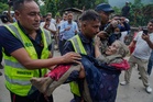 More than 550 missing in Tibet after floods that left hundreds also missing in Nepal