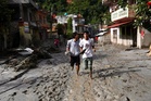 Survivors of Nepal flash floods describe being hit by ‘wall of water’: ‘My wife is still beneath the mud’