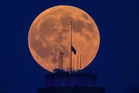 In photos: Blood Moon lunar eclipse lights up skies across the world