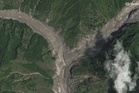 New satellite images show China-Nepal border crossing completely wiped out in flash floods