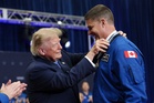 Trump keeps Artemis II astronauts waiting for their medals after he arrives late and then speechifies about what he’ll build next