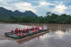 Motorised floating bridge deployed to pick up villagers stranded by flooding in southern China