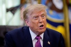 Trump returns from golf club to gripe on Truth Social about Kennedy Center judge and ‘VANDALS’