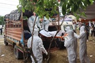 In one Nepal district, flood catastrophe is measured in bodies and burial trenches
