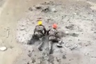 Nepal rescuers crawl through thick mud to save trapped hydropower workers