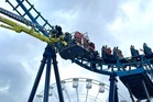 Thrill-seekers rescued from rollercoaster that stopped 50ft in the air