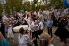 Pupils return to school in Russia and Ukraine as Kyiv students shelter from air raids, in photos
