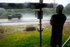 Edouard, now a tropical depression, drenches Texas with flash flooding and downed trees
