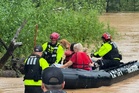 Texas hit with 30 inches of rain in 24 hours during extreme flash-floods as rescues of trapped residents underway