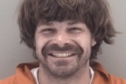 Suspect arrested after smashing 81 car windshields in Virginia parking lot