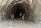 Nepal flood rescuers race to find hundreds that may still be trapped in tunnels