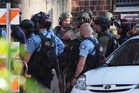 Investigators scour scene of Minneapolis shooting that left 3 dead, including suspect