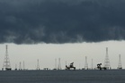 Photos show broken oil infrastructure and blackouts on Venezuela's Lake Maracaibo