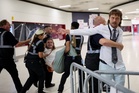Police urge protester who had her hair pulled by Reform audience to come forward
