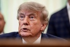 Trump gets testy and calls Iran war ‘small potatoes’ when pressed on length of fight