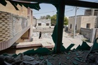 Photos show destruction and mourning after a strike on an Iranian wedding
