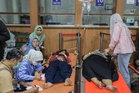 Nearly 2,000 fall ill in suspected food poisoning linked to Indonesia’s free school meals