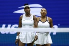 Venus and Serena Williams put on a show in thrilling U.S. Open return, in photos