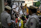 At least seven dead and dozens feared trapped after student housing collapses in Delhi