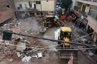 Student building collapses in India with at least six dead and more trapped