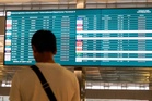 Indonesia reopens airports after volcanic eruption strands 350,000 travellers