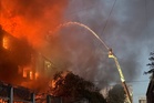 Two killed and several injured as Russia resumes air strikes on Kyiv amid US talks