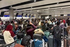 Tens of thousands of passengers face travel chaos after flights halted at UK airports
