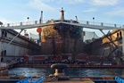 25 dead after cargo ship catches fire in China's port, state media says