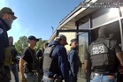 Body camera video offers a rare look inside an immigration raid at a NY factory