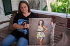 Police say more arrests coming in case of Mississippi woman found dead hanging from tree