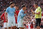 Phil Foden sent off in Manchester derby for wild kick on Bruno Fernandes