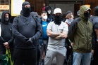 Behind the mask: Why are the far-right now wearing balaclavas?