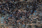 Photos of the funeral for victims of a deadly prison fire and riot in northern Syria