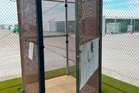 'Alligator Alcatraz' detainees were held in small metal cages, federal report says