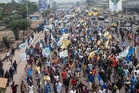 Police fire tear gas to break up Congo protests against constitutional changes