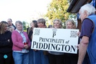 ‘Principality of Piddington’: village backs independence amid migrant camp row