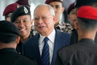 Malaysia's king allows former leader Najib to serve rest of his graft sentence under house arrest