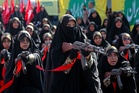Iranians stage massive rally as Tehran urges citizens to take up arms