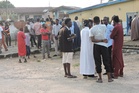 Nigeria police fire tear gas at protesters gathering over the deaths of 37 miners in custody