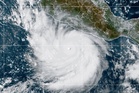 Offshore Hurricane Polo sends rain into Mexico's coast as Nolo nears Hawaii