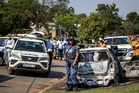 A mass shooting at a house party in South Africa kills 11, including a pregnant woman