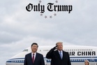Trump shared a photo of meeting China’s Xi at the airport. The internet has a lot of questions