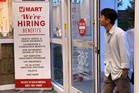 Claims for unemployment benefits drop to 197,000, the lowest since mid-July as layoffs remain rare