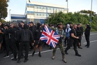 Protest at police station following far-right activist Danny Tommo’s arrest after dinghy slashed in Channel