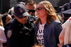 Hollywood actors detained by police as hundreds protest outside UN