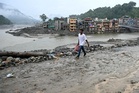 Nepal paying ‘colossal price’ for climate crisis after deadly floods