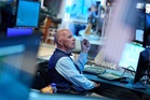 Asian shares are mixed after global bond sell-off and drop in oil prices